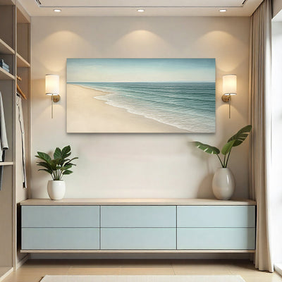 Beach Shoreline II coastal canvas wall art above a console between two wall sconces