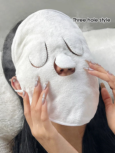 Woman wearing the three-hole compress face towel with ear loops