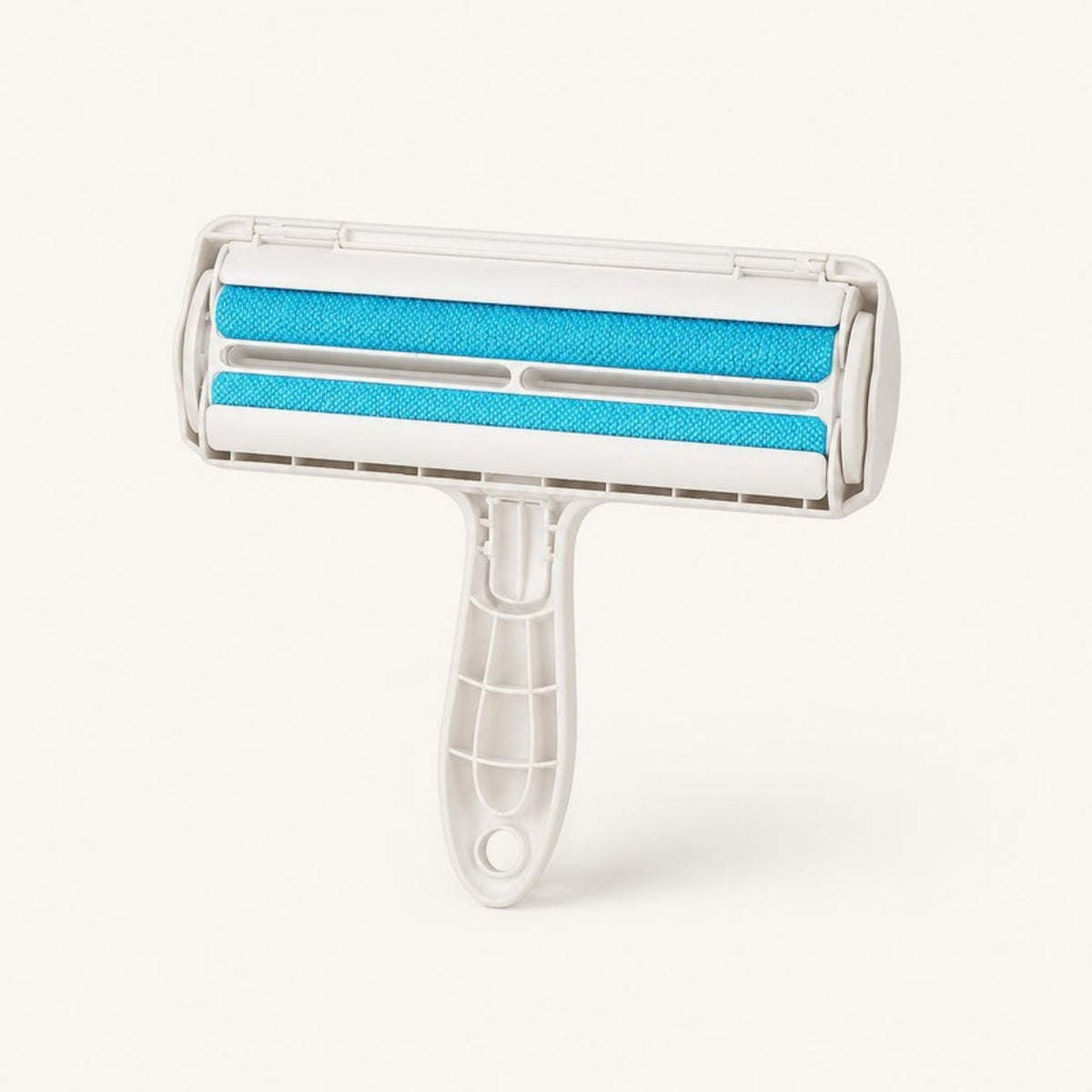 Self-cleaning pet hair roller with blue rollers on a warm ivory background