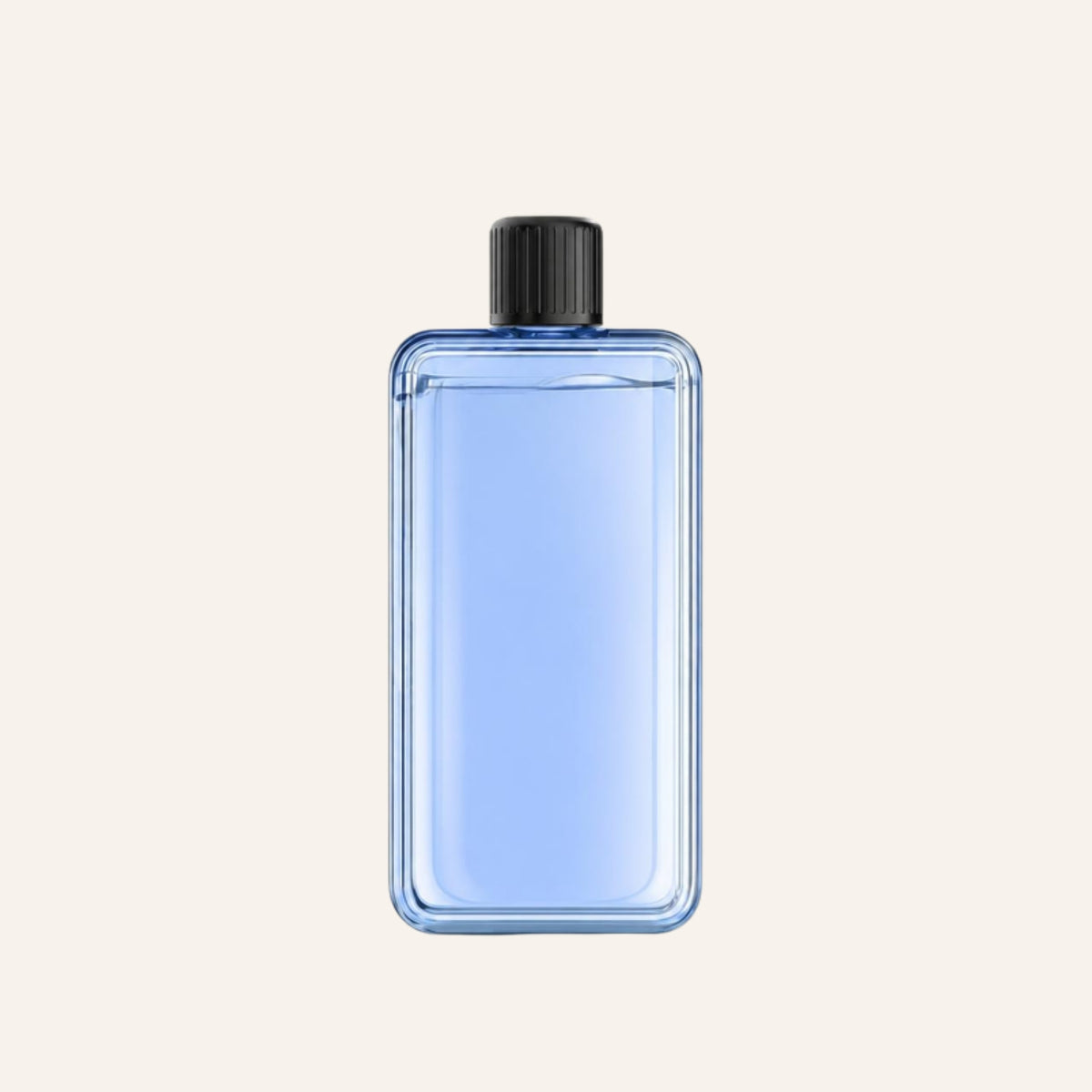 Blue Real Me fragrance oil refill bottle on an ivory background