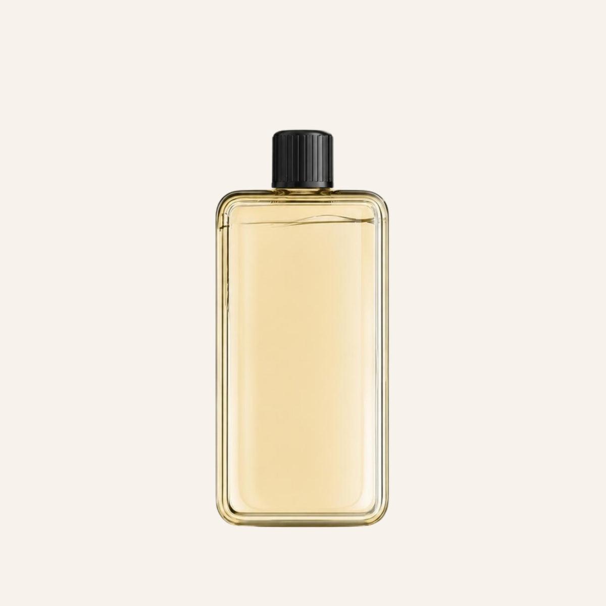 Pale gold Resort fragrance oil refill bottle on an ivory background