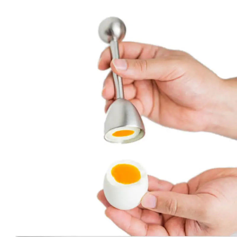 Hands lifting the egg topper off a soft-boiled egg with a clean round cut