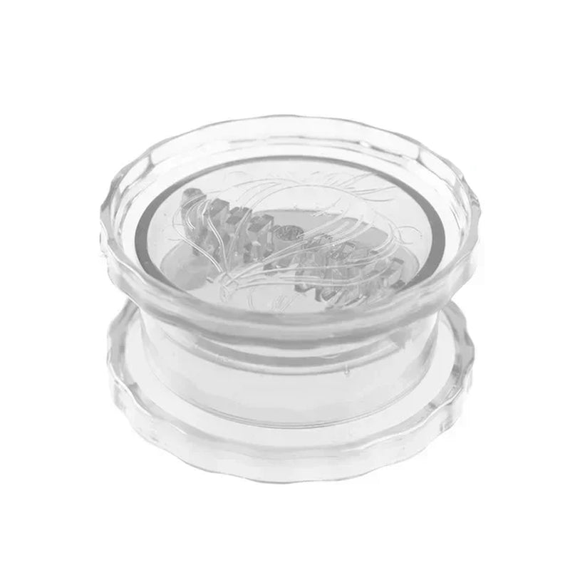Transparent twist garlic crusher on a white background