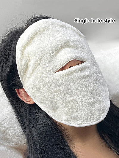 Woman wearing the single-hole compress face towel