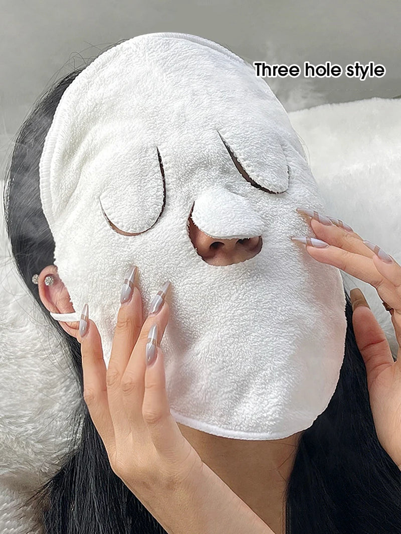Woman wearing the three-hole compress face towel with ear loops